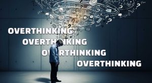 Man overthinking struggling with his thoughts